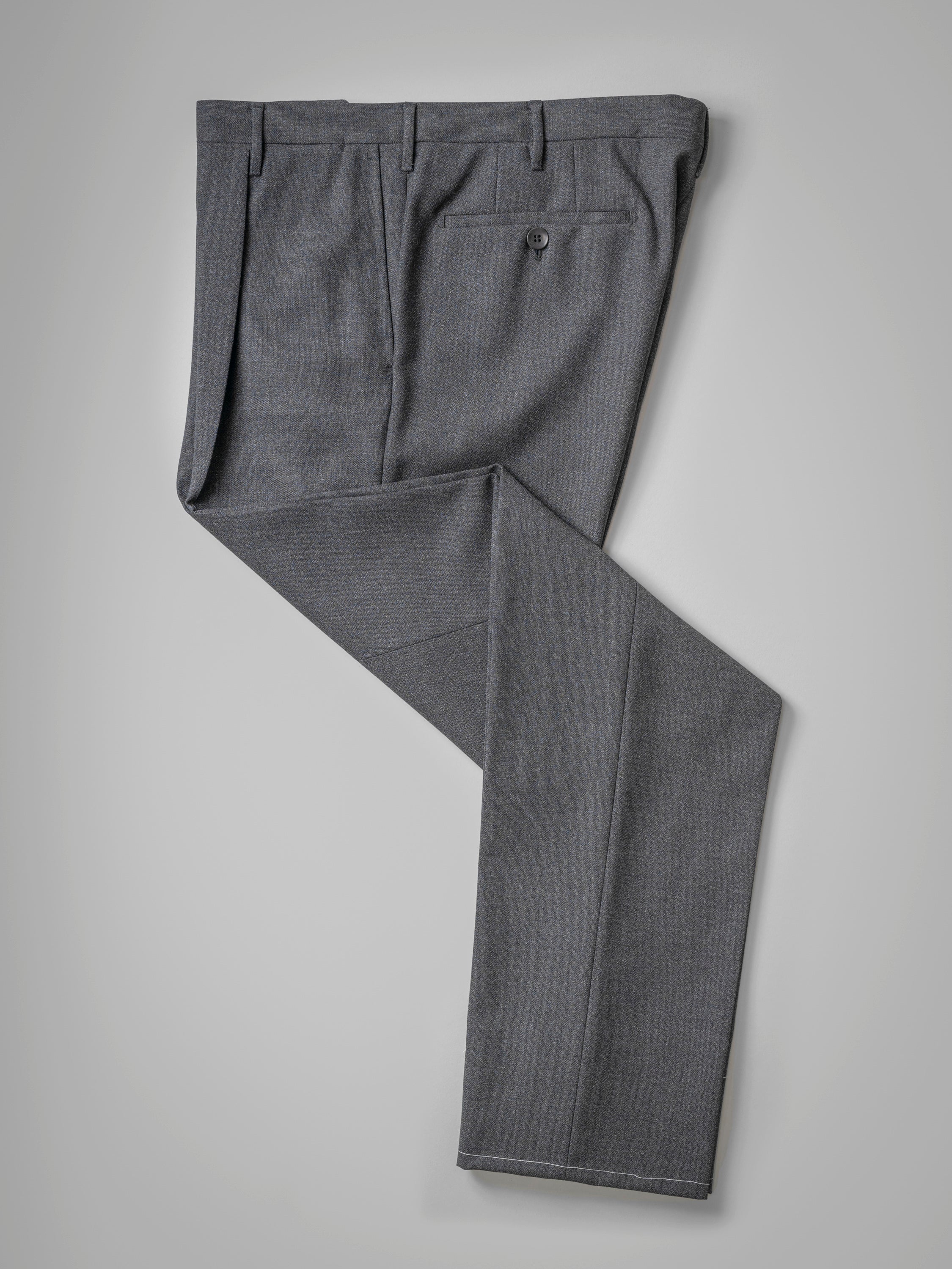 Dark grey pair of regular fit four ply wool trousers